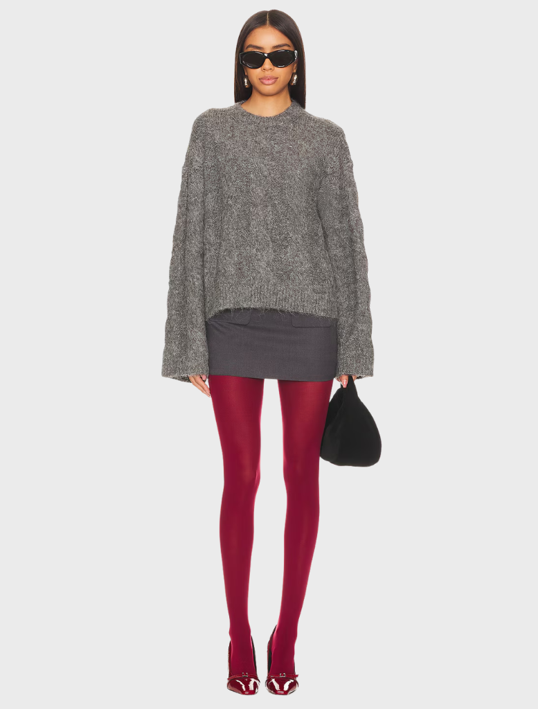 Burgundy solid tights displayed on a white background, showcasing their smooth texture and rich color.