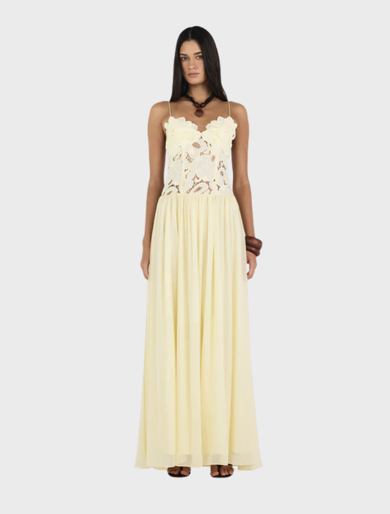 Elegant Stephanie maxi dress in a light butter hue, featuring a relaxed fit ideal for summer events.