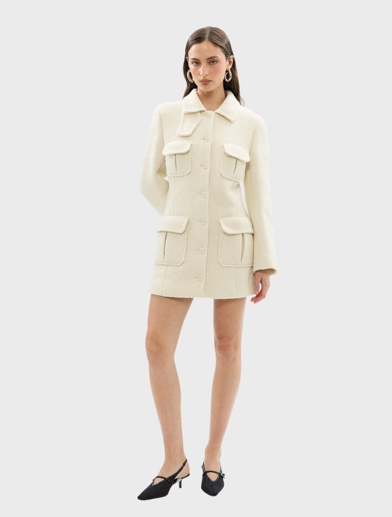 Chic ivory Franca Wool Blazer Dress showcasing a structured fit, suitable for business and upscale events.