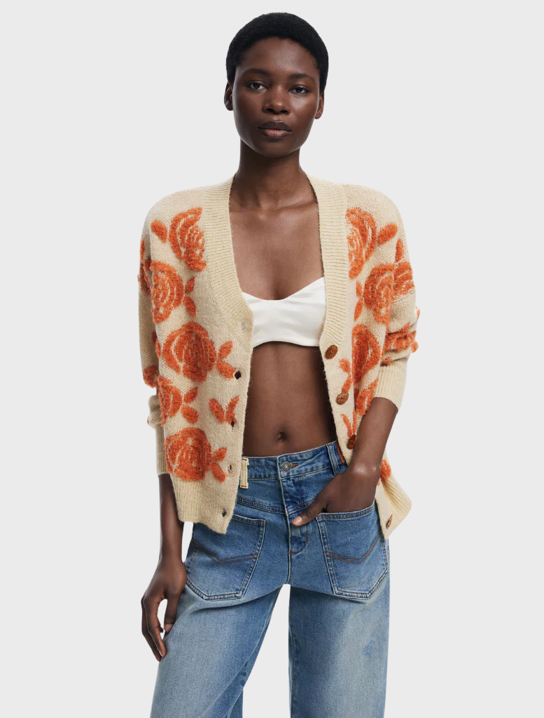 Thick gauge jacket featuring a vibrant floral print, ideal for stylish warmth in cooler weather.