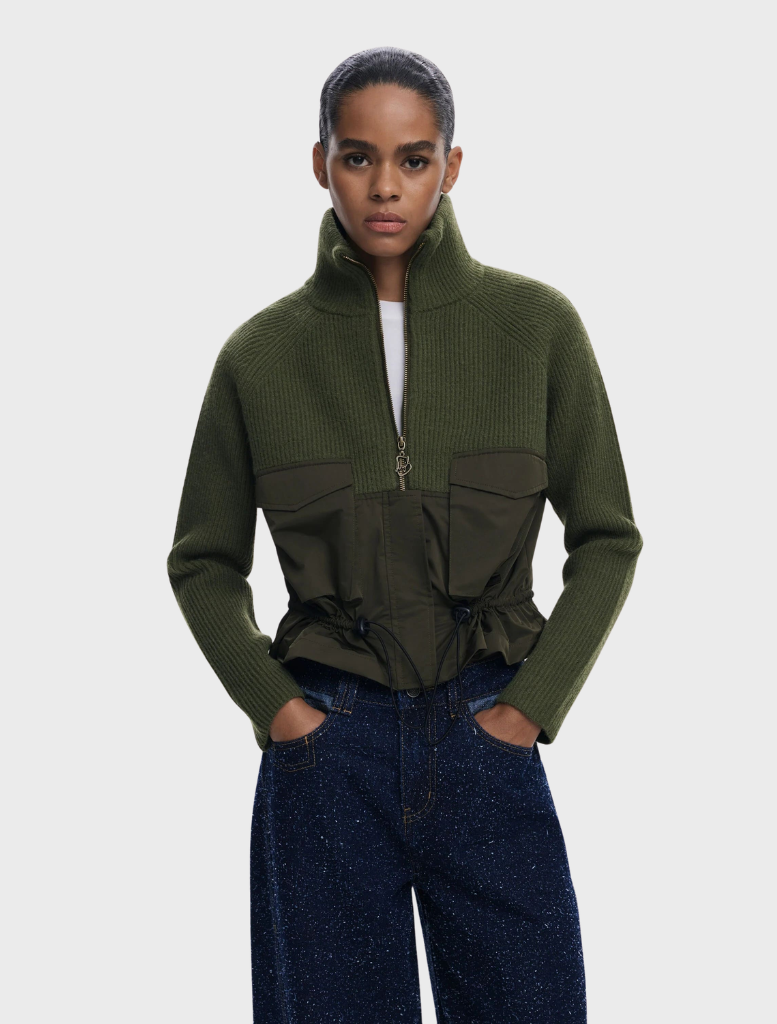 Thick khaki jacket with a sturdy design, featuring a front zipper and side pockets for added functionality.