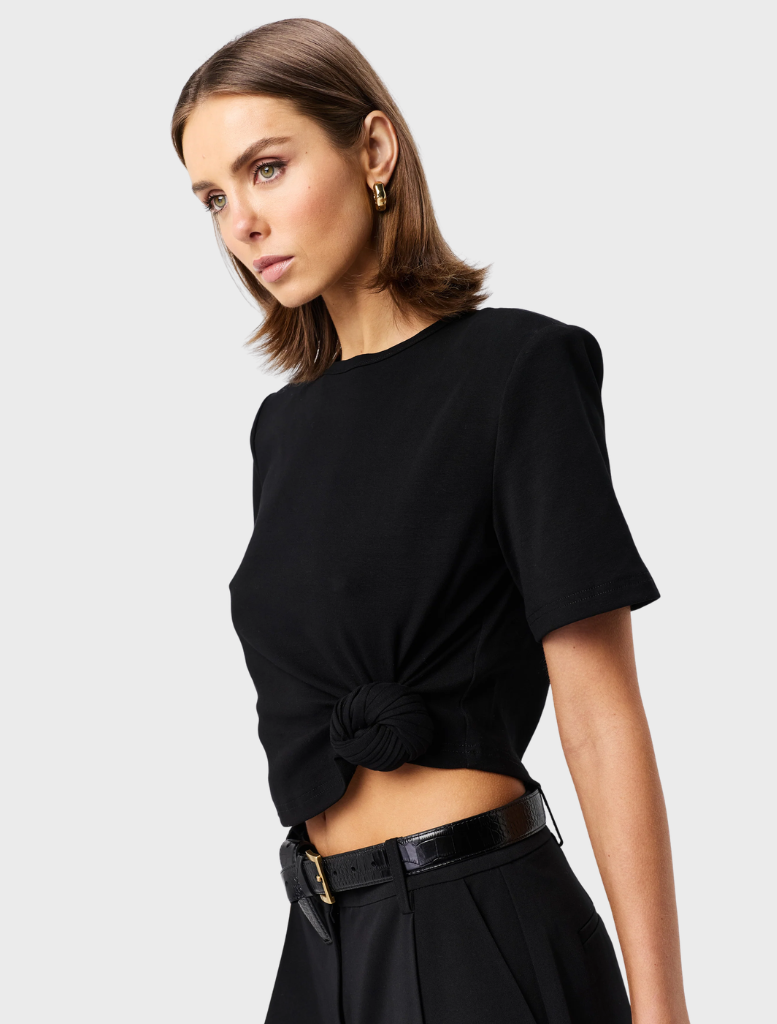 Stylish black Tied & True Top, offering a contemporary look for casual outings or formal gatherings.