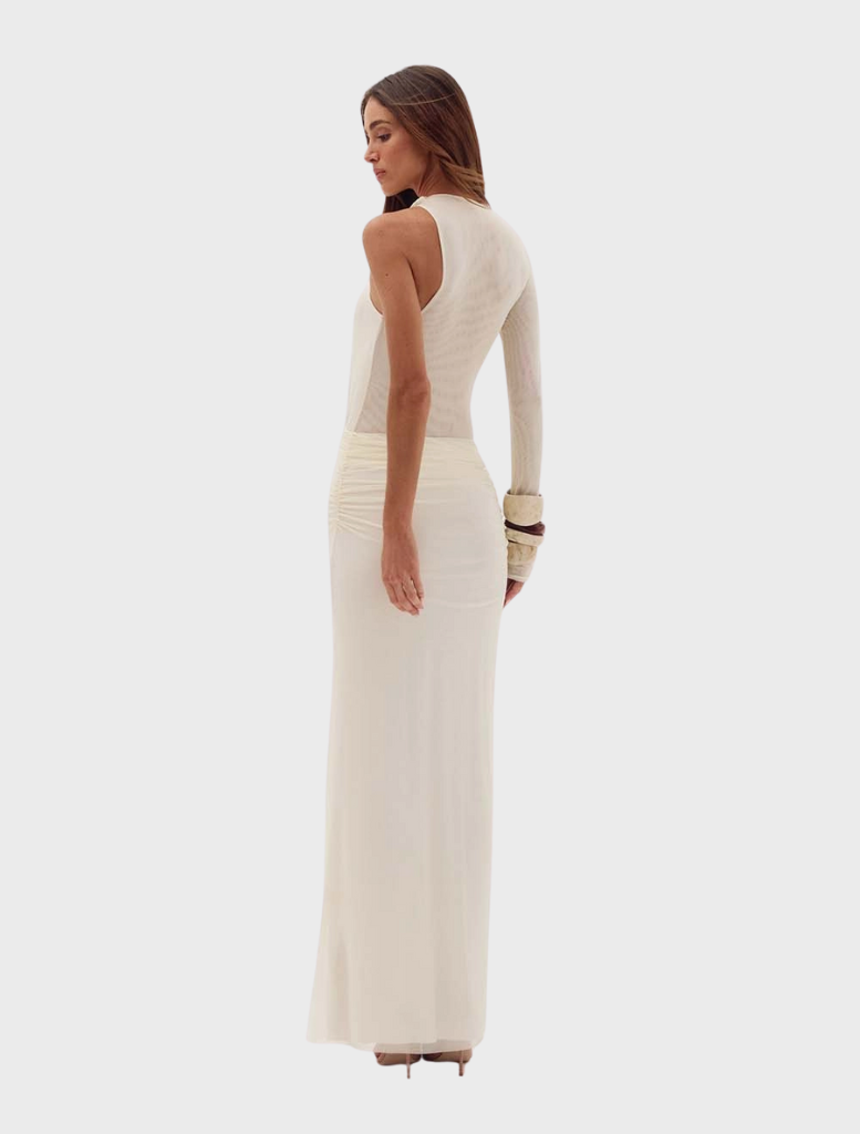 Frigga Tule Dress in off-shell, featuring a lightweight design that combines elegance and comfort for any summer event.