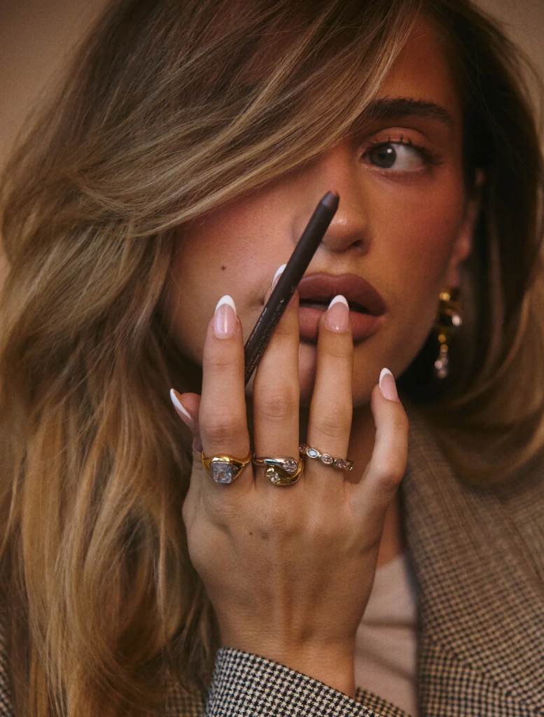 Gold and white diamond Bianco Nero Interlock Ring, featuring a two-tone design with elegant interlocking elements.