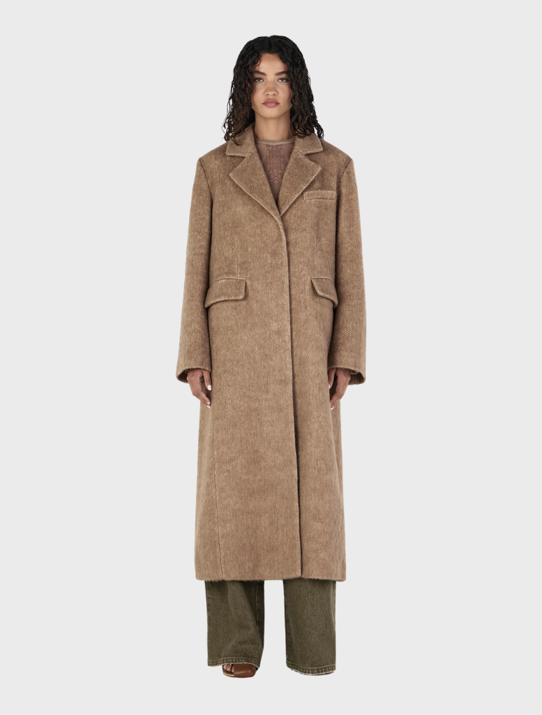 Valerie Coat in a soft oat hue, designed for elegance and warmth, ideal for both casual and formal wear.