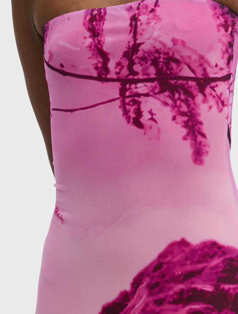 Pink vest laid flat, emphasizing its sleek design and vibrant color, suitable for both casual and semi-formal occasions.