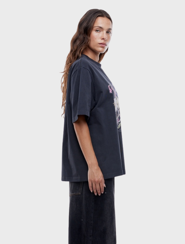 Vintage black Bouquet Tee with a stylish floral print, ideal for a relaxed yet chic outfit.