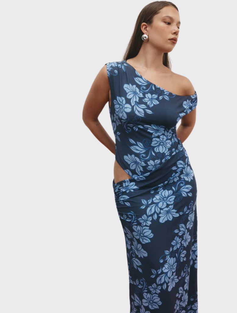 Elegant navy maxi dress with a rolling waves pattern, designed for a flowing and stylish look.