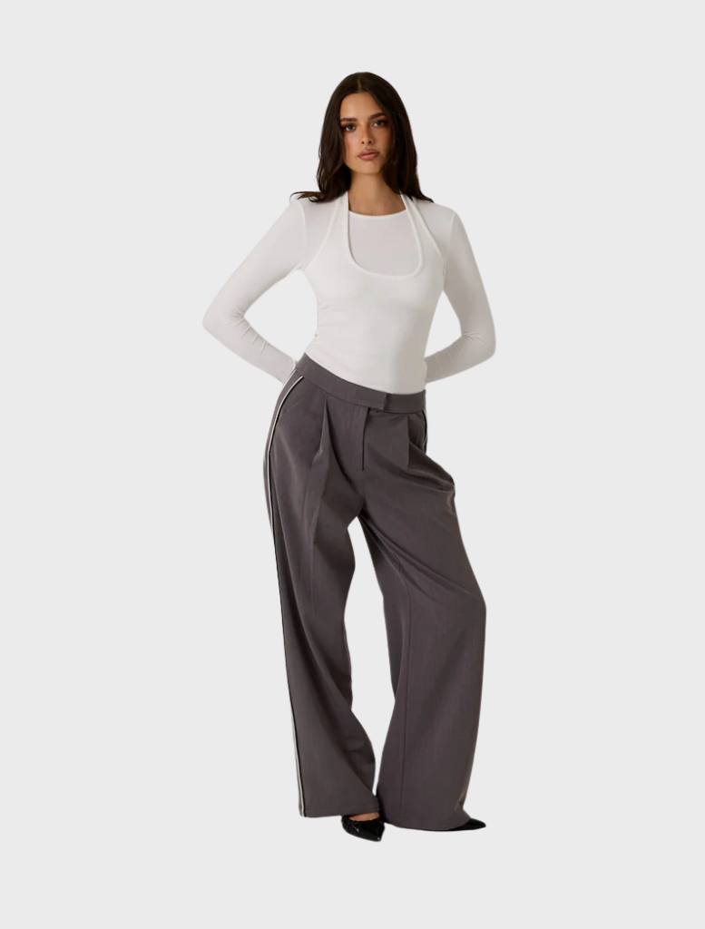 Elegant white double layer top from Gia, perfect for layering and enhancing any outfit.