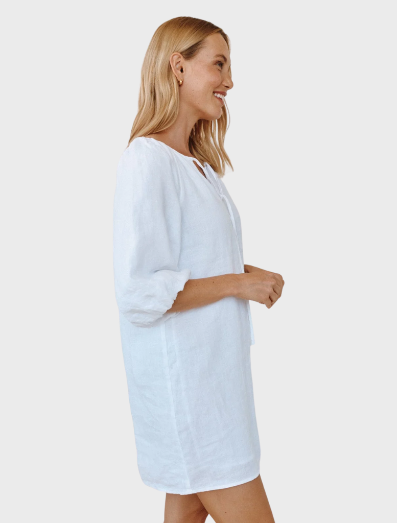 Stylish white pullover dress adorned with puff sleeves, ideal for various events and outings.