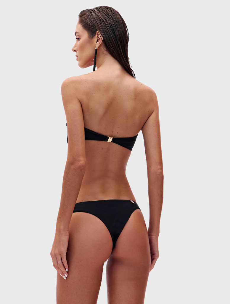 Trendy black Karima set that includes a stylish top and complementary bottoms, ideal for casual or formal wear.