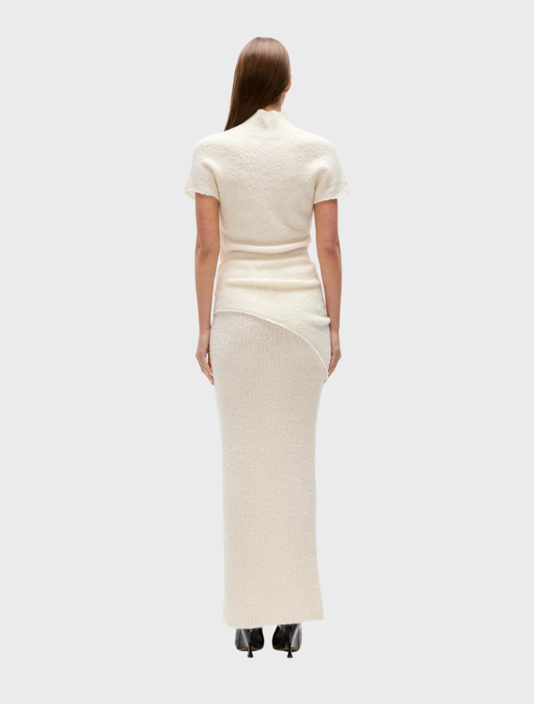 Evren knit top in white, featuring a classic design suitable for casual wear.