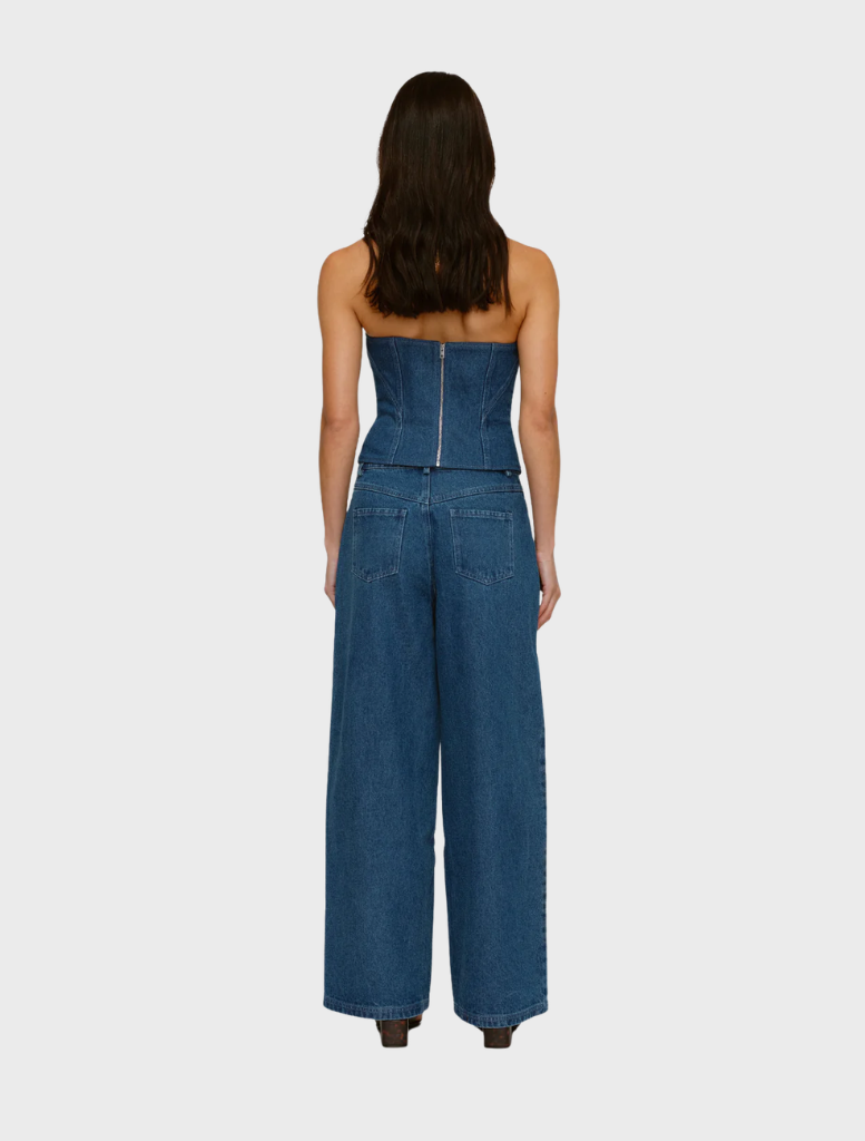 Chic bluestone denim bustier with a form-fitting design, perfect for enhancing any wardrobe with a trendy look.