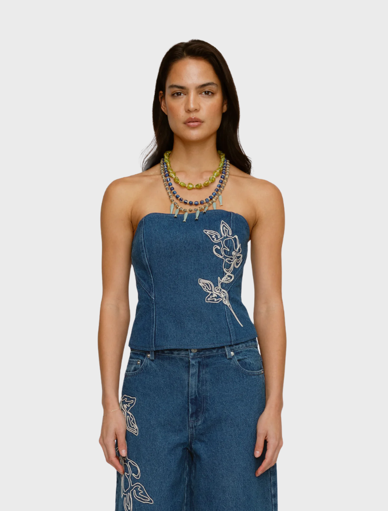 Bluestone denim bustier featuring a fitted design and structured silhouette, ideal for stylish layering or standalone wear.