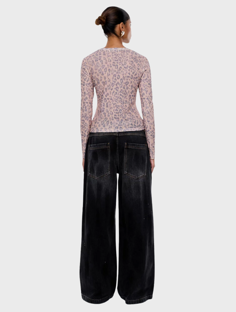 Fashionable long sleeve leopard top, ideal for casual outings and versatile styling options.