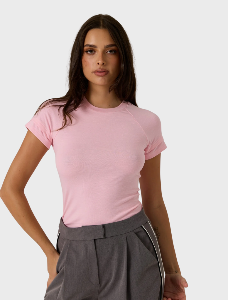 Zarah Baby Tee in pop pink, featuring a soft fabric and a stylish, casual design for everyday wear.