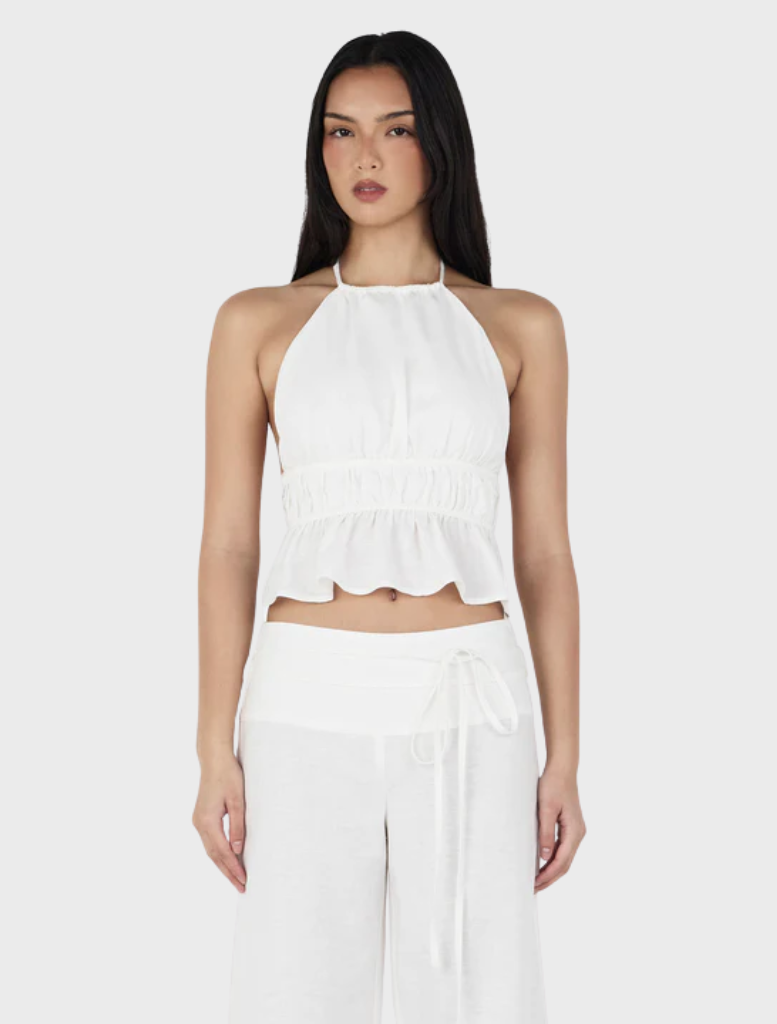 Zuri Halter Top in ivory, featuring a stylish design suitable for casual or formal occasions.