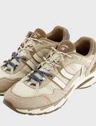 Stylish running sneaker with a breathable mesh upper, suede accents, and a durable rubber outsole for stability and grip.
