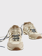 Modern retro running sneaker with a breathable upper, suede details, and a durable outsole for enhanced traction and comfort.