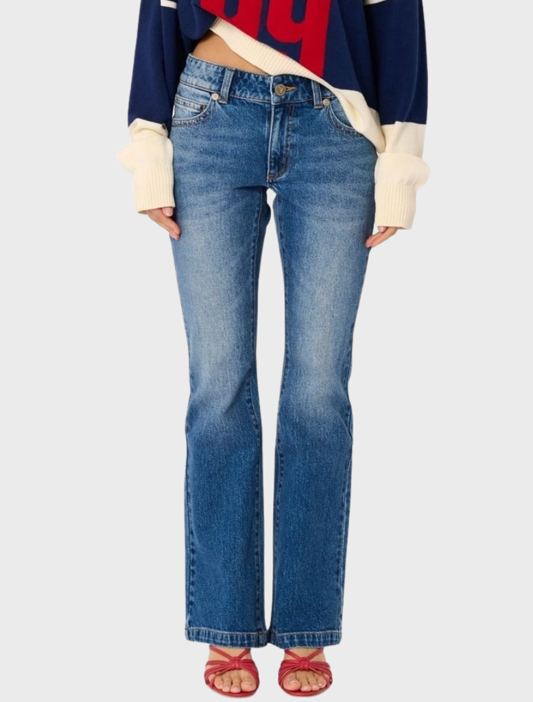 Low-rise bootcut jeans with a fitted top block, crafted from comfort stretch denim for a flattering silhouette.