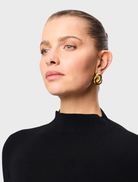 Stylish black Windsor knit top designed for versatility, ideal for both everyday wear and special events.