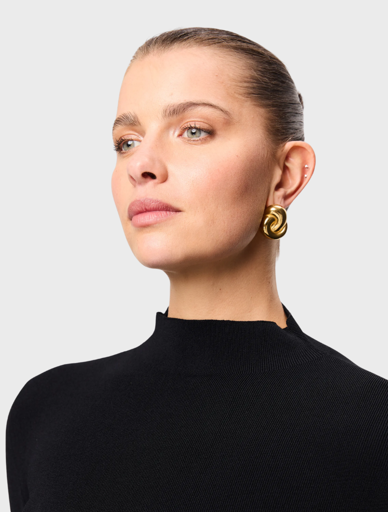 Stylish black Windsor knit top designed for versatility, ideal for both everyday wear and special events.