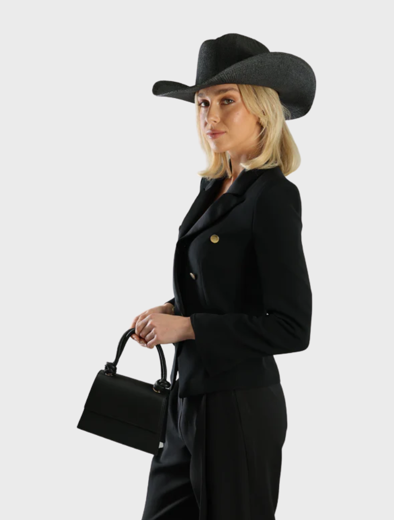 Black Addison Cowboy hat showcasing a traditional shape and embellishments, suitable for casual or themed occasions.
