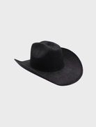 Elegant black Addison Cowboy hat with a broad brim and intricate details, enhancing western-inspired fashion.
