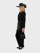 Black fedora by Addison Racewear, showcasing a refined design suitable for both racing and everyday use.