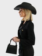 Classic black Addison Cowboy hat designed for versatility, complementing both casual and formal western looks.
