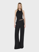 Aeris Pants in black, designed with stretchy fabric for a comfortable and stylish fit.