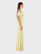 Fitted kiwi maxi dress with off-the-shoulder style, flaring at the hem, overlay bust detail, and fully lined for elegance.