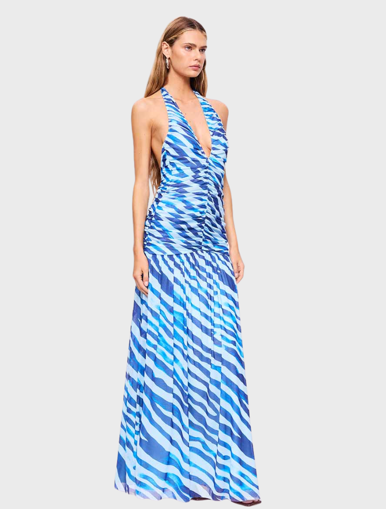 Elegant blue zebra halter maxi dress with a flowing design, perfect for summer events or beach outings.