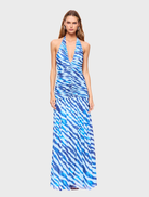 Blue zebra print halter maxi dress, featuring a flowing silhouette and elegant design suitable for casual or formal occasions.