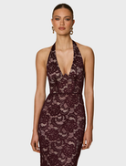 Wine-colored Alessia gown with a flattering fit and elegant draping, designed for upscale events and gatherings.