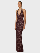 The Alessia gown in rich wine hue features a graceful design, ideal for evening events and special celebrations.