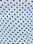 Amelia Top in blue with small white dots, featuring a stylish and modern design suitable for casual wear.