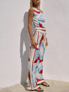 Amoree Red Wide Leg Palazzo Pant, showcasing a chic and relaxed silhouette perfect for casual or dressy occasions.
