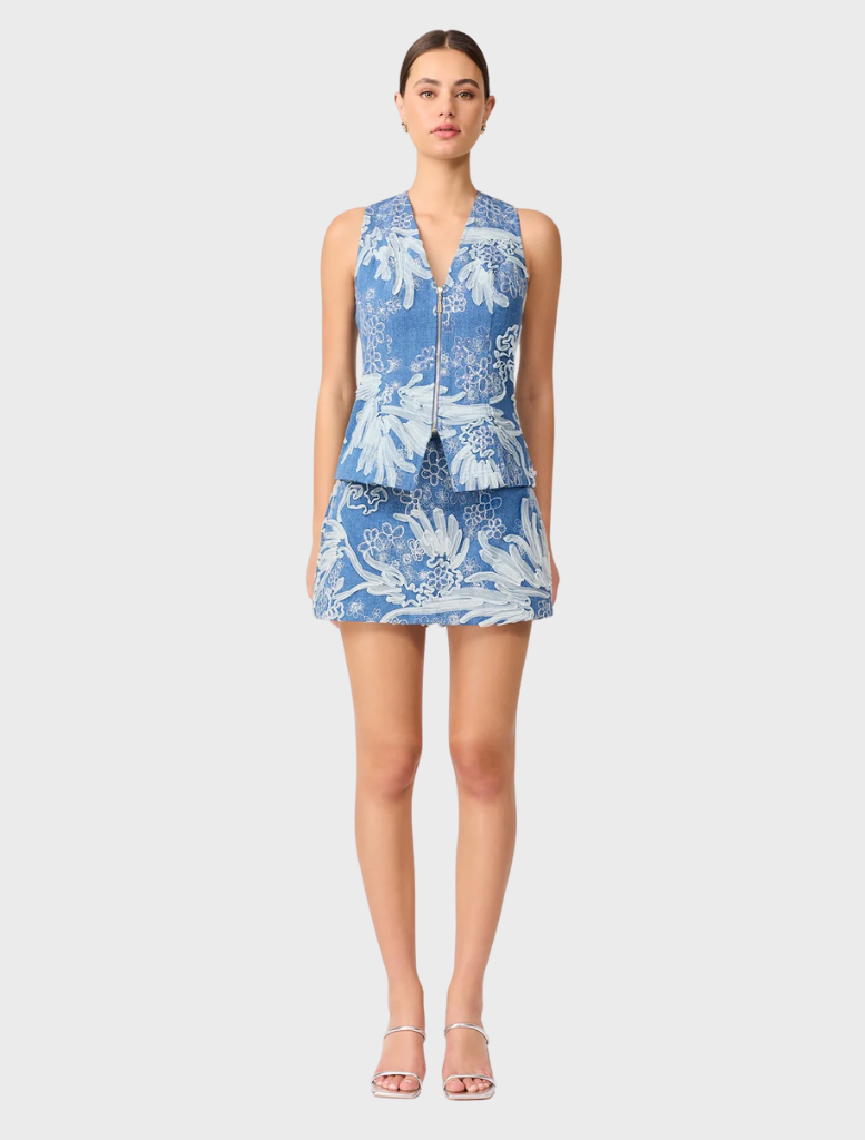 Anneliese Denim Set in blue and ivory, featuring a stylish top and matching bottoms for a chic casual look.