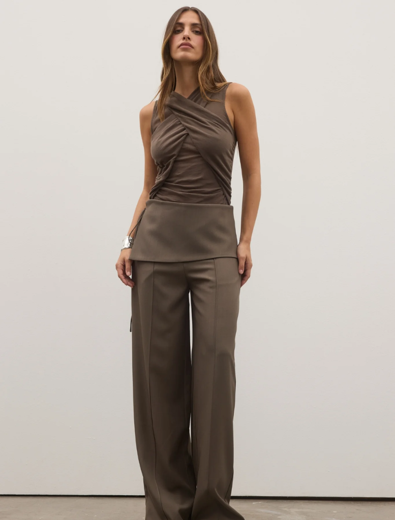 Elegant tanbark Antonia bodysuit showcased on a model, highlighting its smooth fabric and modern cut.