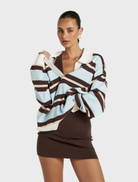 Contemporary striped long-sleeve polo, combining comfort and style for casual and weekend wear.