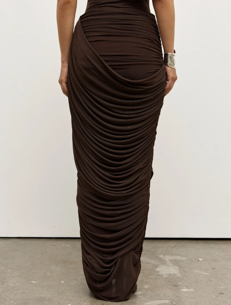 Nara skirt in a muted ash hue, designed for a relaxed silhouette, suitable for both day and evening wear.