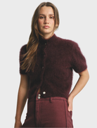Elegant short sleeve cardigan in aubergine, made from luxurious cashmere for warmth and style.