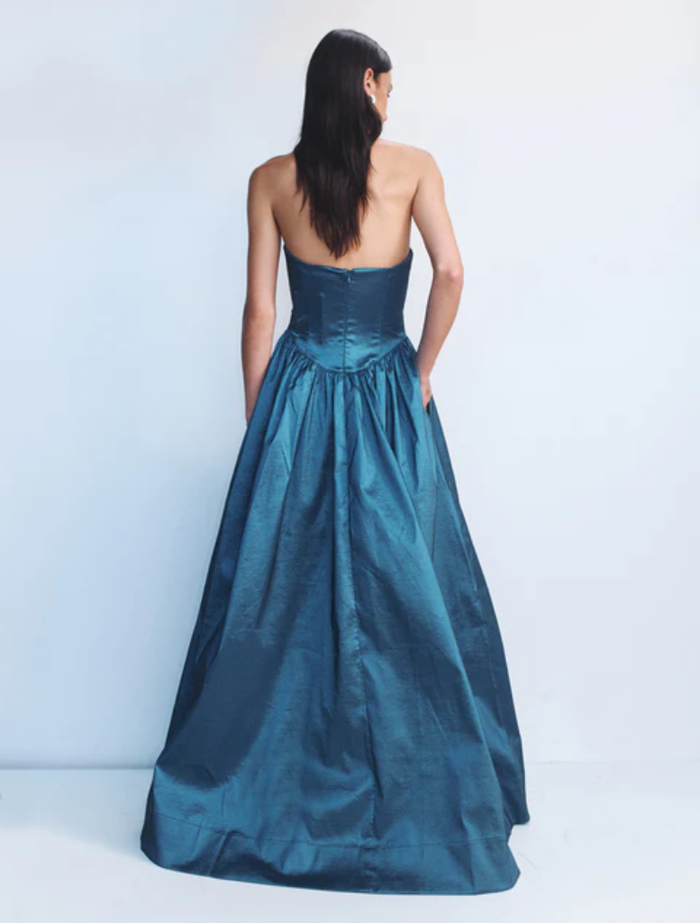 Steel-hued Audrey gown featuring a sophisticated design and graceful draping, ideal for evening events.