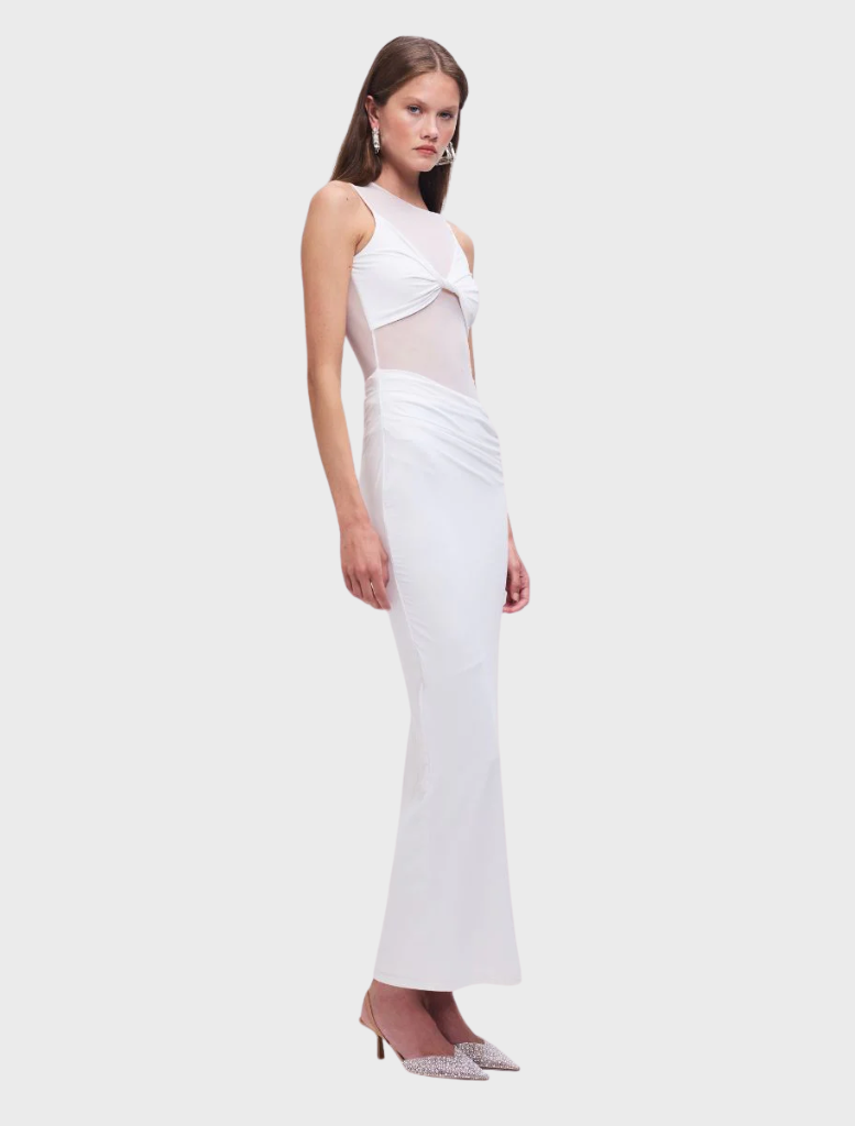 Chic white sleeveless maxi dress with a long, flowing cut, suitable for both casual and formal summer gatherings.