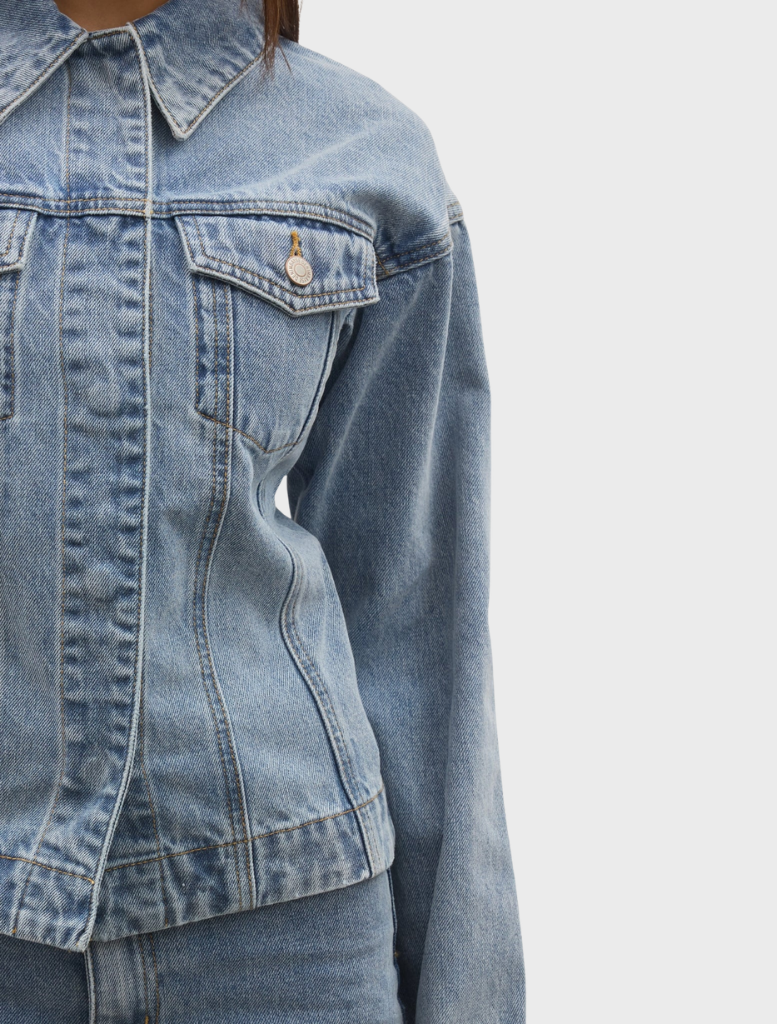 Aven Denim Jacket from Atlanta, showcasing a timeless denim style with a tailored fit and functional pockets.