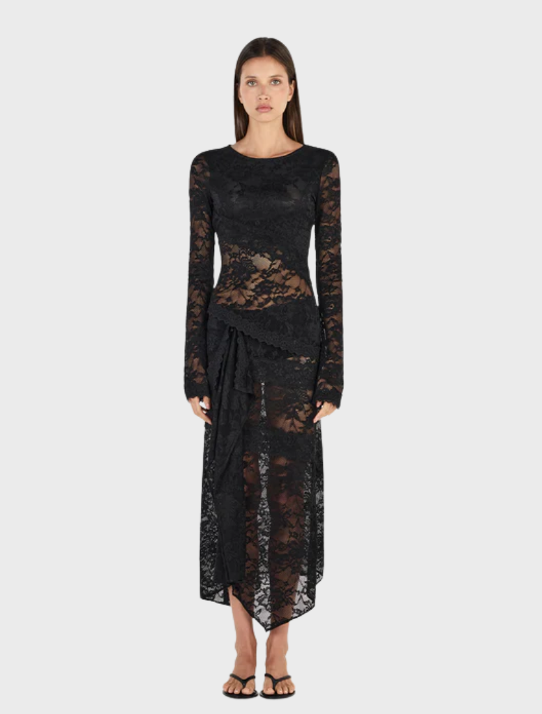 Black Avery top showcased, featuring a contemporary design that complements both casual and dressy looks.