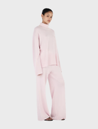 Soft blush Bay Cashmere Jumper on display, emphasizing its cozy texture and refined appearance.