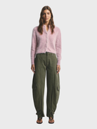 Bella Cashmere Cardigan in a soft Petal Cloud color, designed for comfort and sophistication in any wardrobe.
