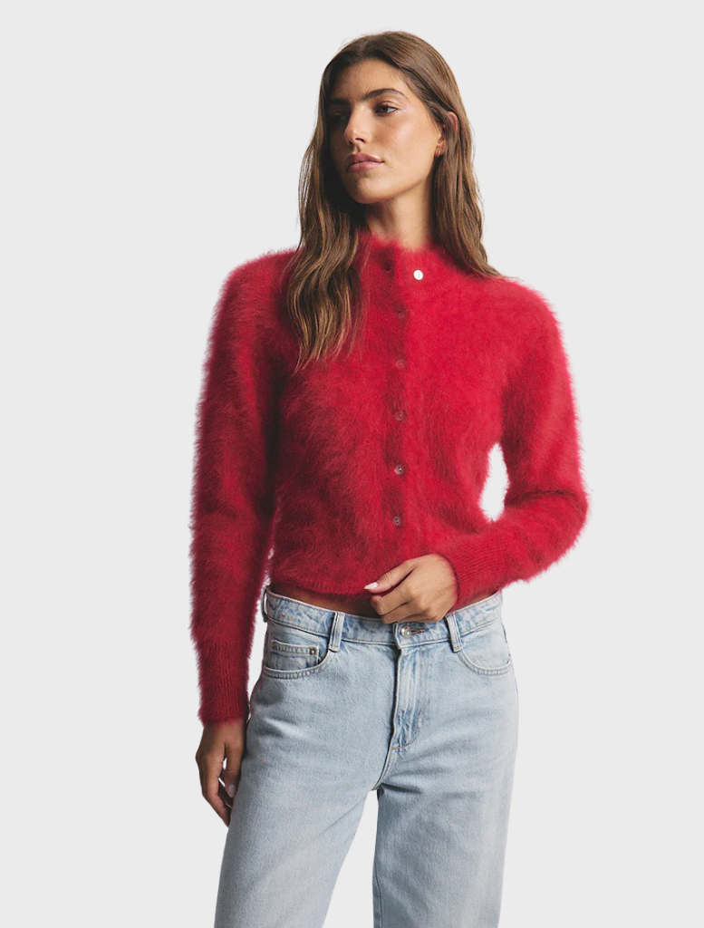 Bella Cashmere Cardigan in a vibrant flame color, showcasing a soft texture and elegant design for stylish layering.